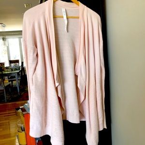 Light pink Lululemon wrap with hidden thumb hole and pockets!